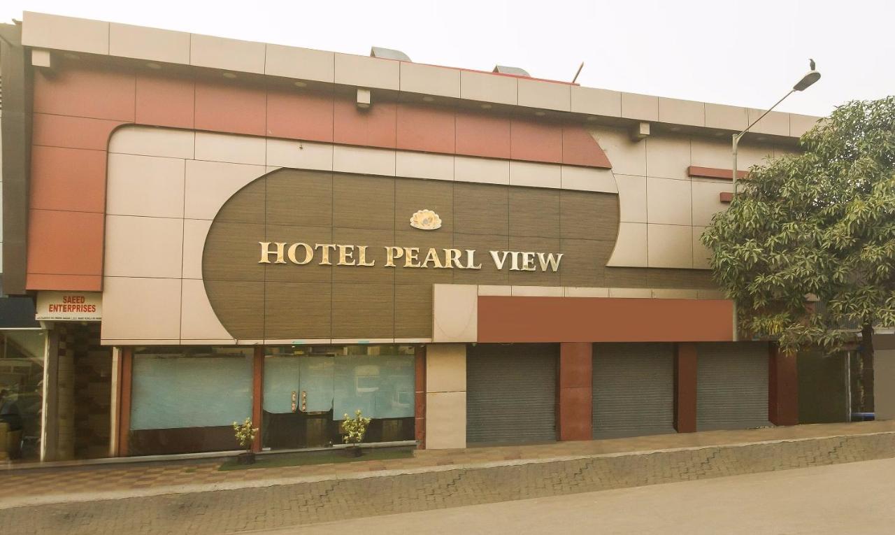 Capital O Hotel Pearl Near Us Embassy Mumbai Exteriör bild