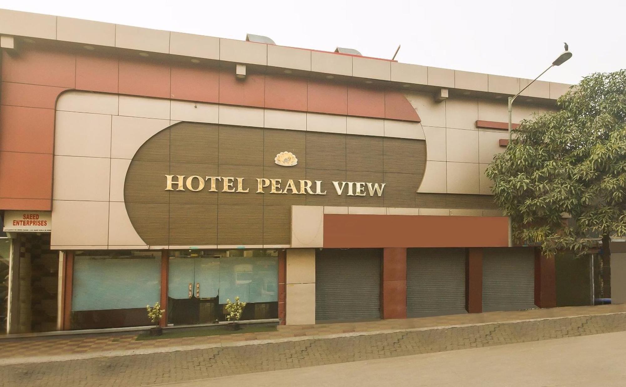 Capital O Hotel Pearl Near Us Embassy Mumbai Exteriör bild